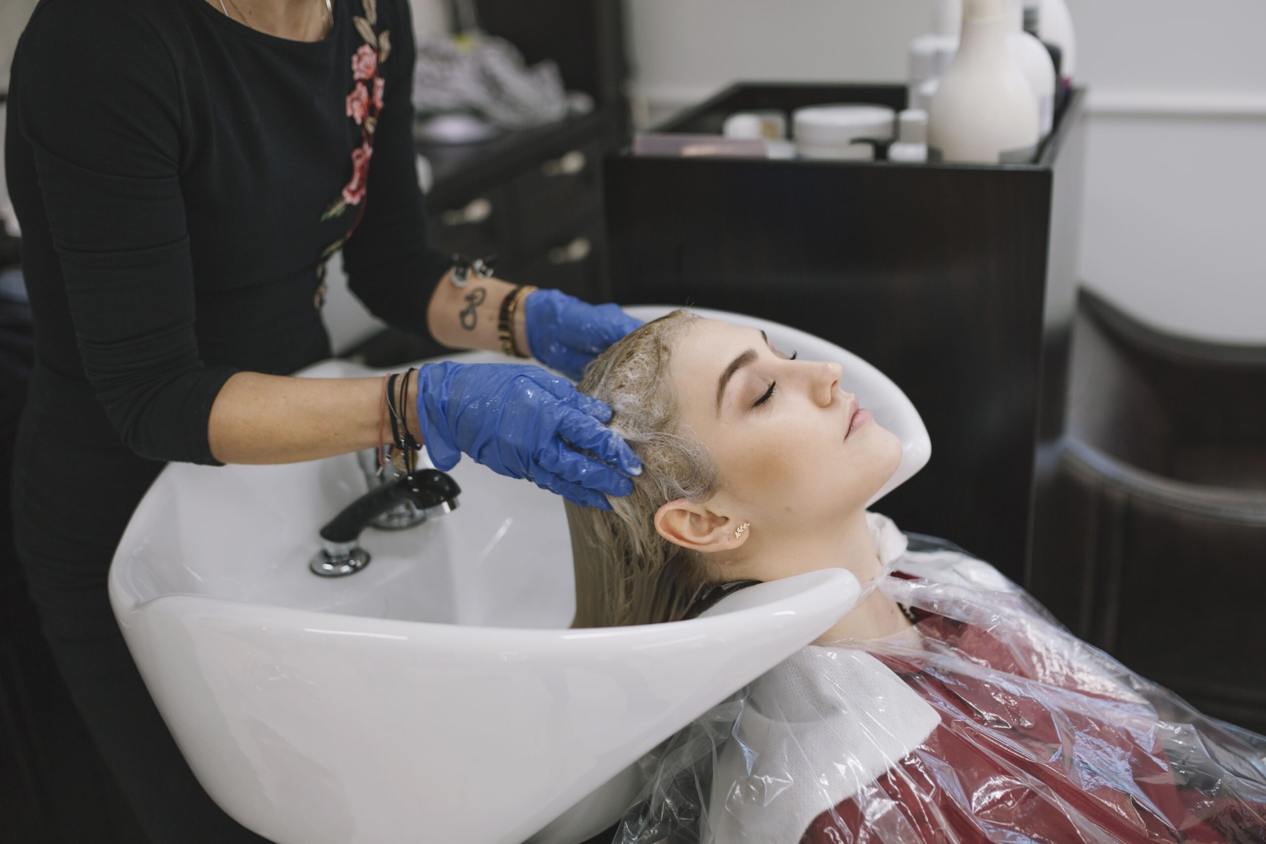 hairdresser-taking-care-client-salon